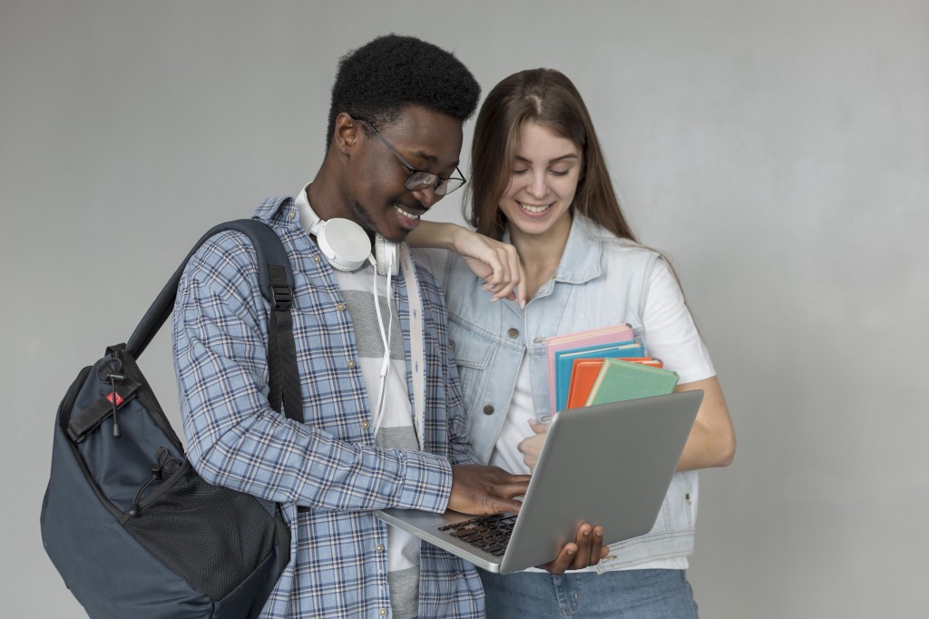 students-with-laptop-medium-shot