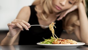 close-up-woman-with-eating-disorder