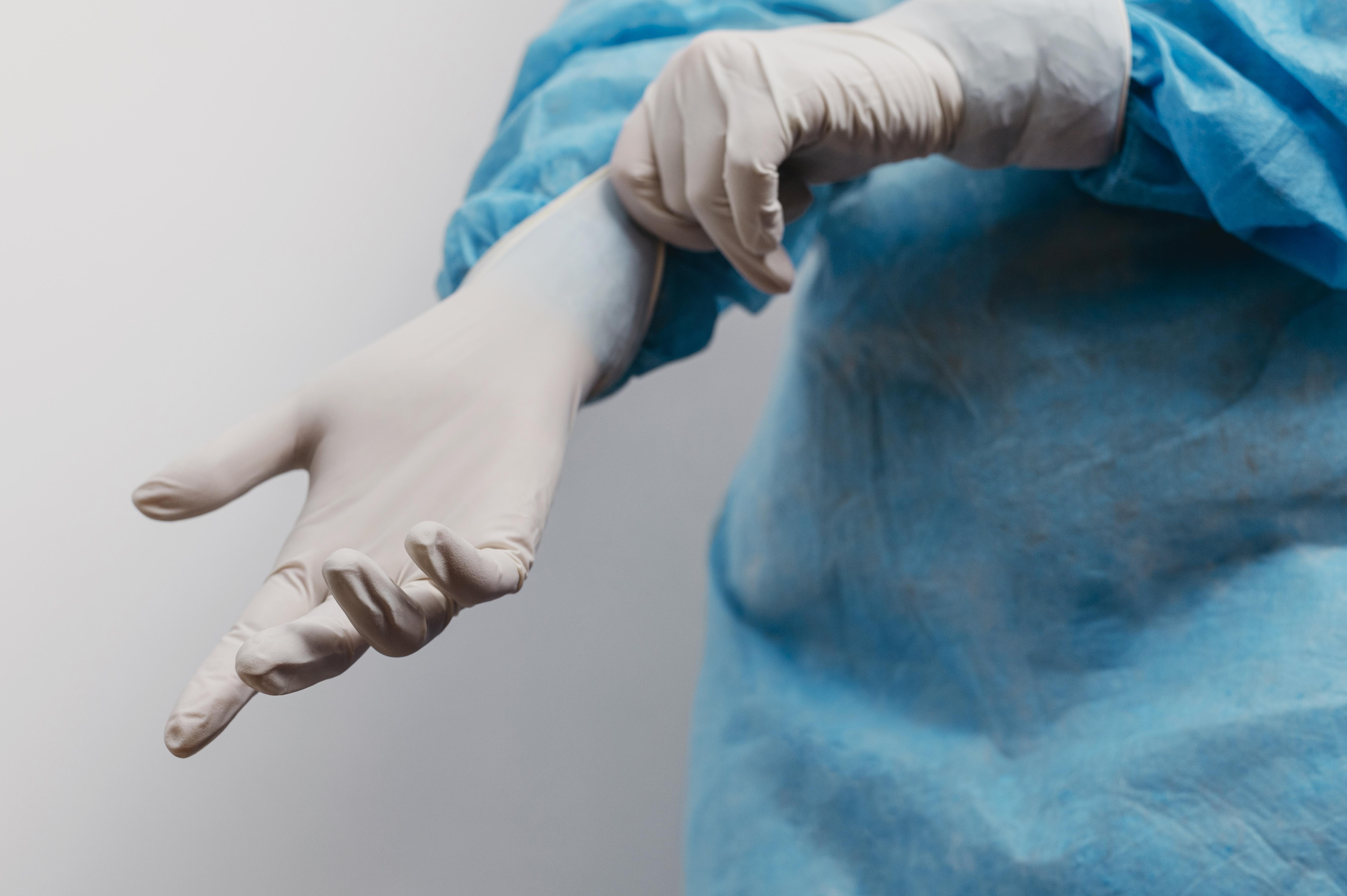 young-doctor-wearing-surgical-gloves