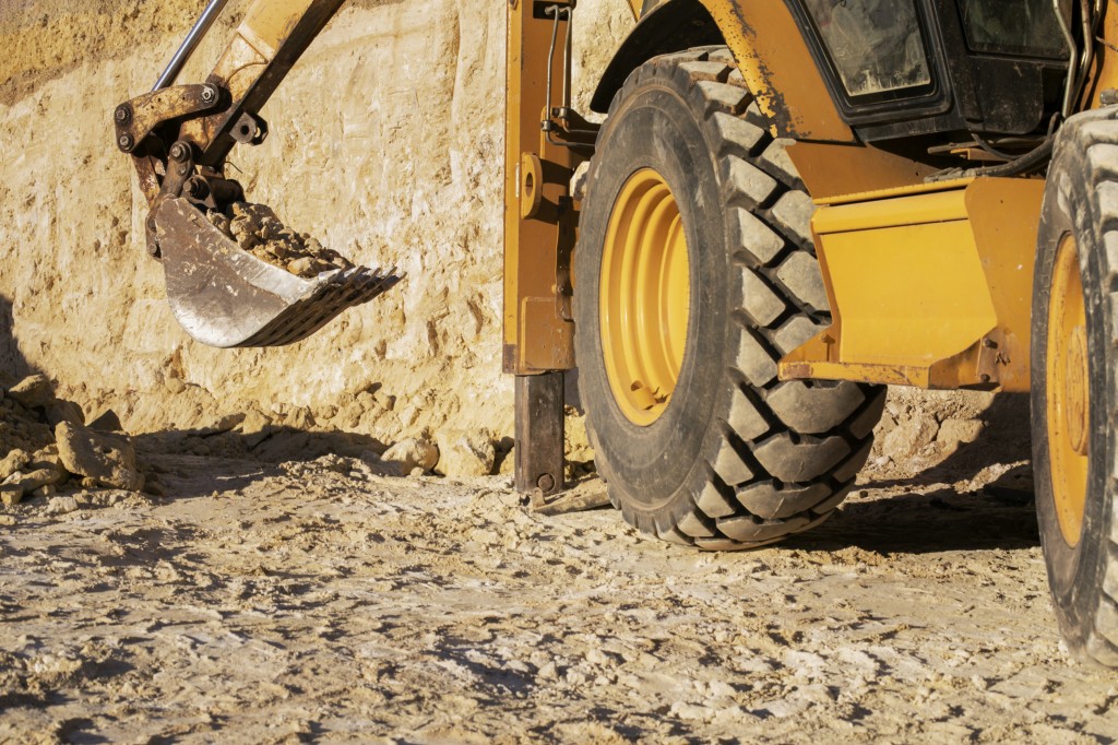 excavator-digging-ground-day-light