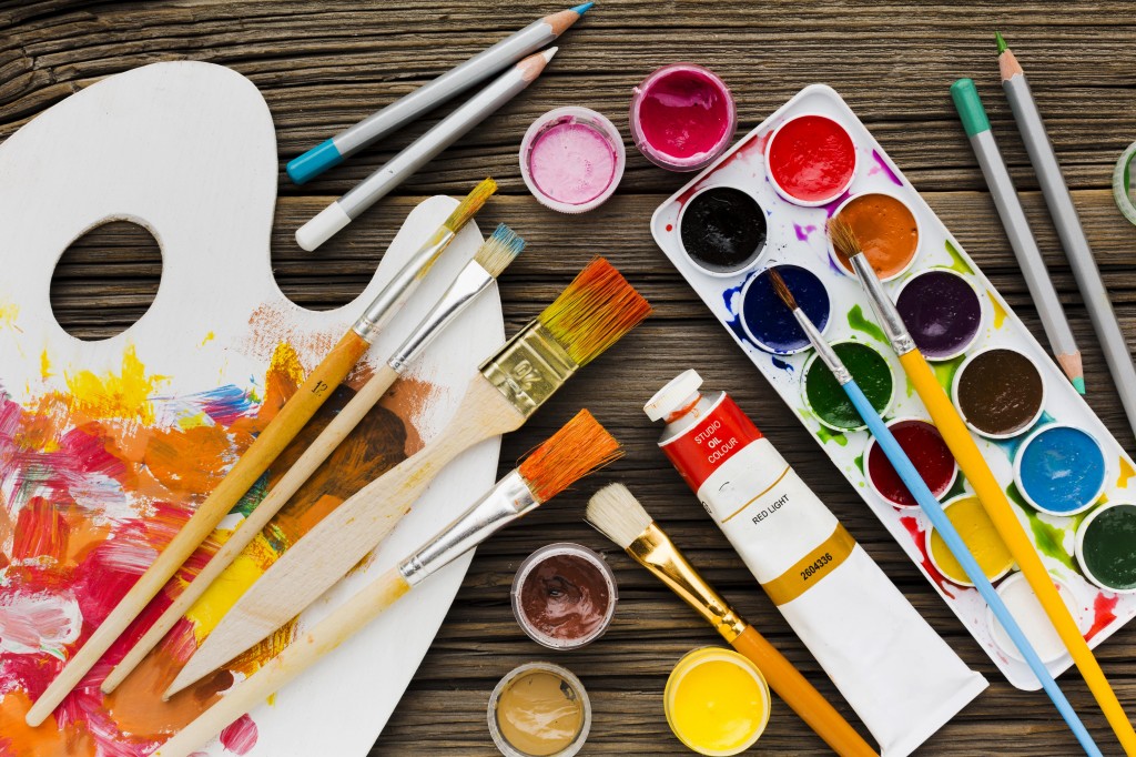 flat-lay-assortment-paint-brushes-pencils
