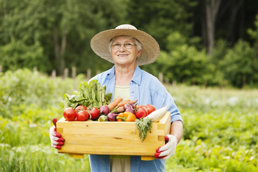 Senior woman with vegetables