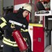 male-firefighter-station-equipped-with-suit-safety-helmet