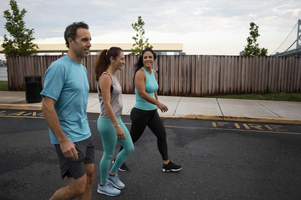 medium-shot-people-walking-together