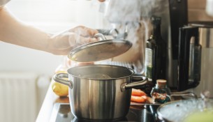 Man cooking fresh food at home