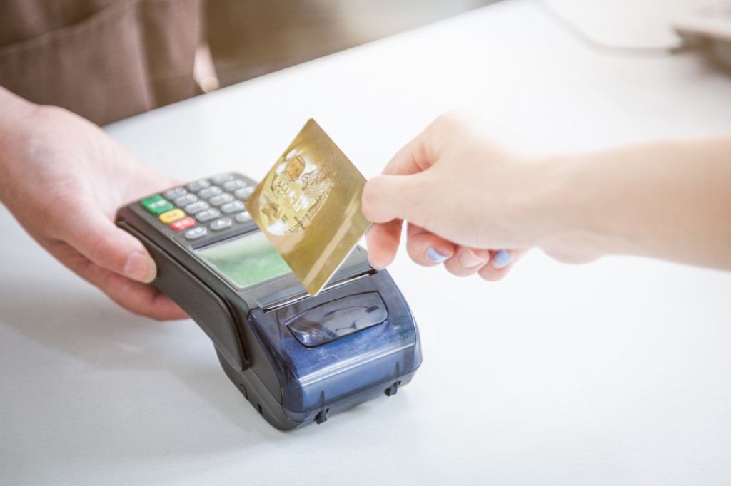 Card payment with chip and pin machine in shop