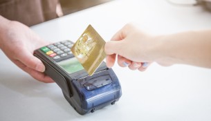 Card payment with chip and pin machine in shop