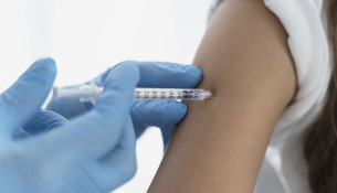 close-up-doctor-vaccinating-little-girl