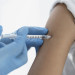 close-up-doctor-vaccinating-little-girl