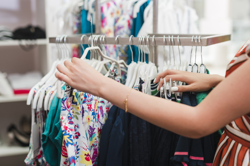 close-up-woman-checking-clothes