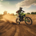 Motocross mounted motorcyclist doing a race on a dirt track.