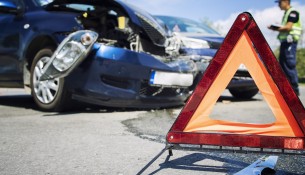 Road accident with smashed cars.