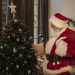 santa-claus-touching-christmas-tree