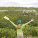 back-view-young-traveller-happy-be-outdoors