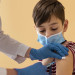 close-up-boy-with-mask-getting-vaccine