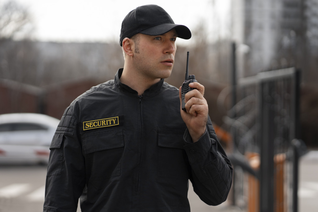 portrait-male-security-guard-with-radio-station