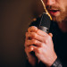 Singer with microphone singing in studio