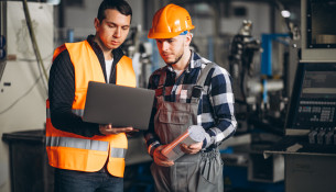 Two colleagues at a factory